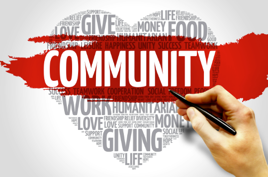 A painting saying Community